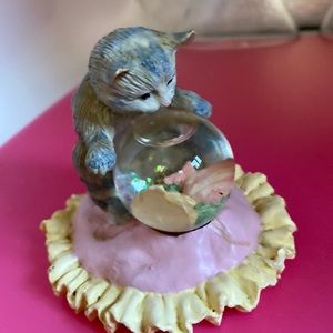 Cute kitty fishing!  There’s a fish in the bowl he’s looking at